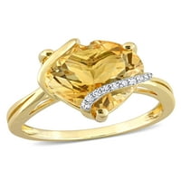Prsten od sterling srebra obložen žutim rodijem ukrašen 6-karatnim citrinom i dijamantom, s omotanim kamenom
