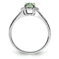 Prsten od srebra sa zelenim kvarcom i dijamantom. Težina karata je 0,1 karata. Težina dragulja-0,8 karata