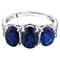 Prsten od tri kamena ovalnog oblika u 14k plavom safiru i dijamantu od bijelog zlata